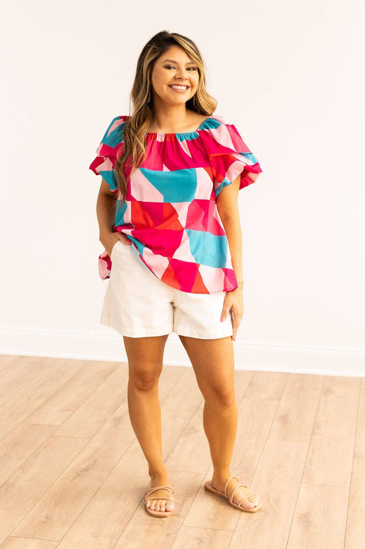 The Faelan Puff sleeve top with a multicolor print