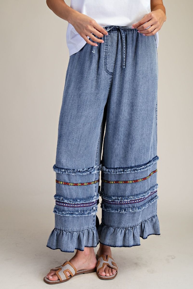 EASEL RUFFLE BOTTOM STONE WASHED CHAMBRAY PANTS