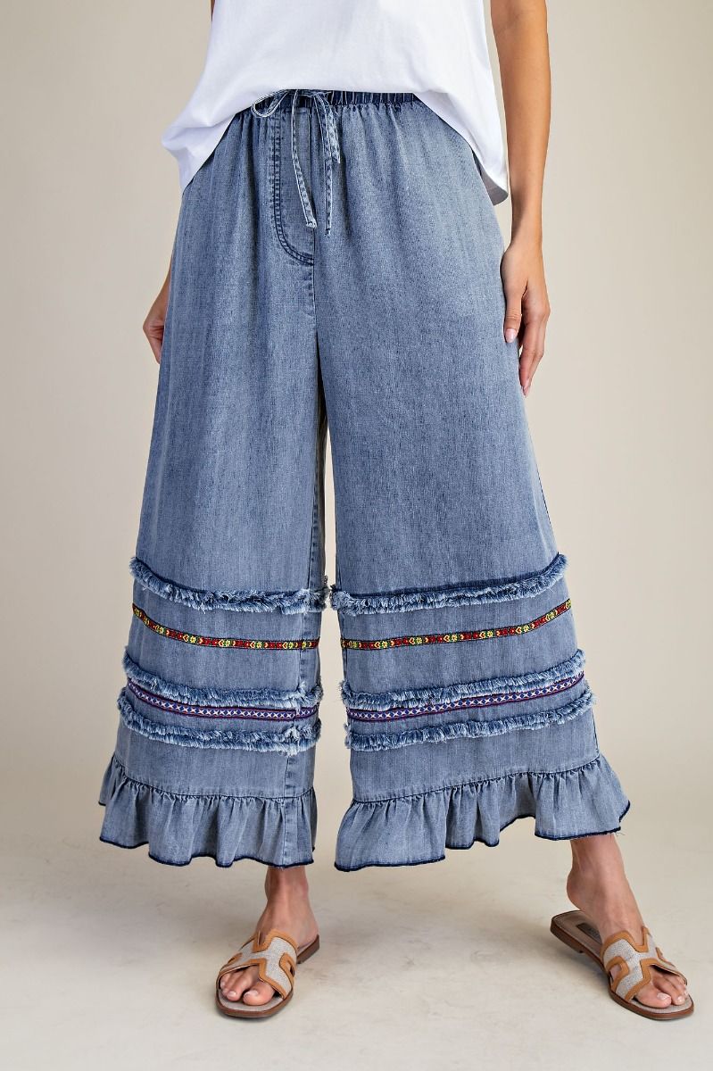 EASEL RUFFLE BOTTOM STONE WASHED CHAMBRAY PANTS