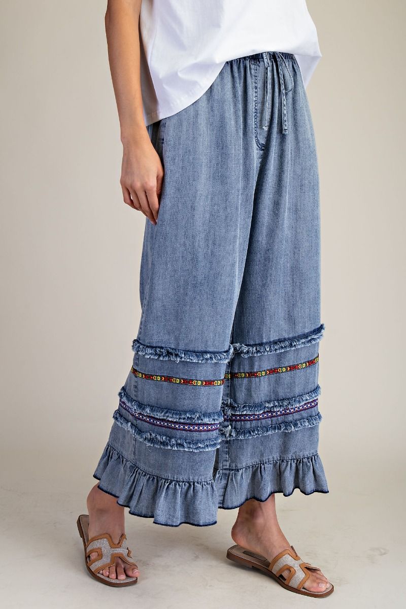 EASEL RUFFLE BOTTOM STONE WASHED CHAMBRAY PANTS