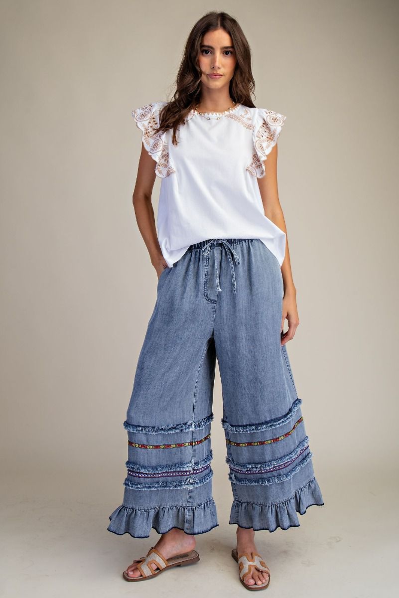 EASEL RUFFLE BOTTOM STONE WASHED CHAMBRAY PANTS